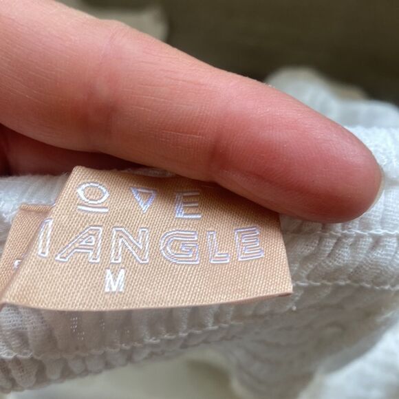 LOVE TRIANGLE
SWEET SENSATION TIE FRONT S/S MINI DRESS WHITE M NWT - Picture 7 of 8